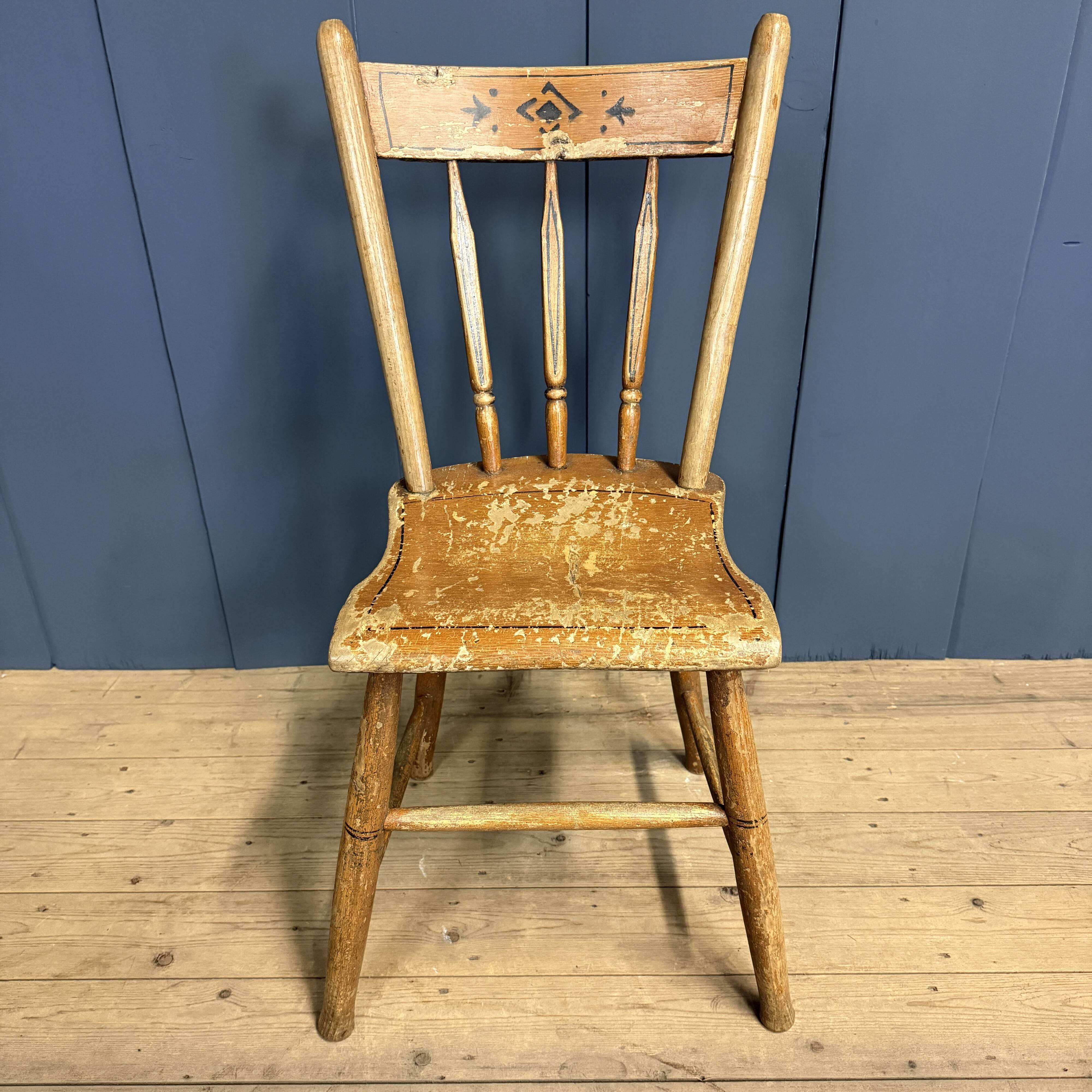 Set of four painted Dutch kitchen chairs.