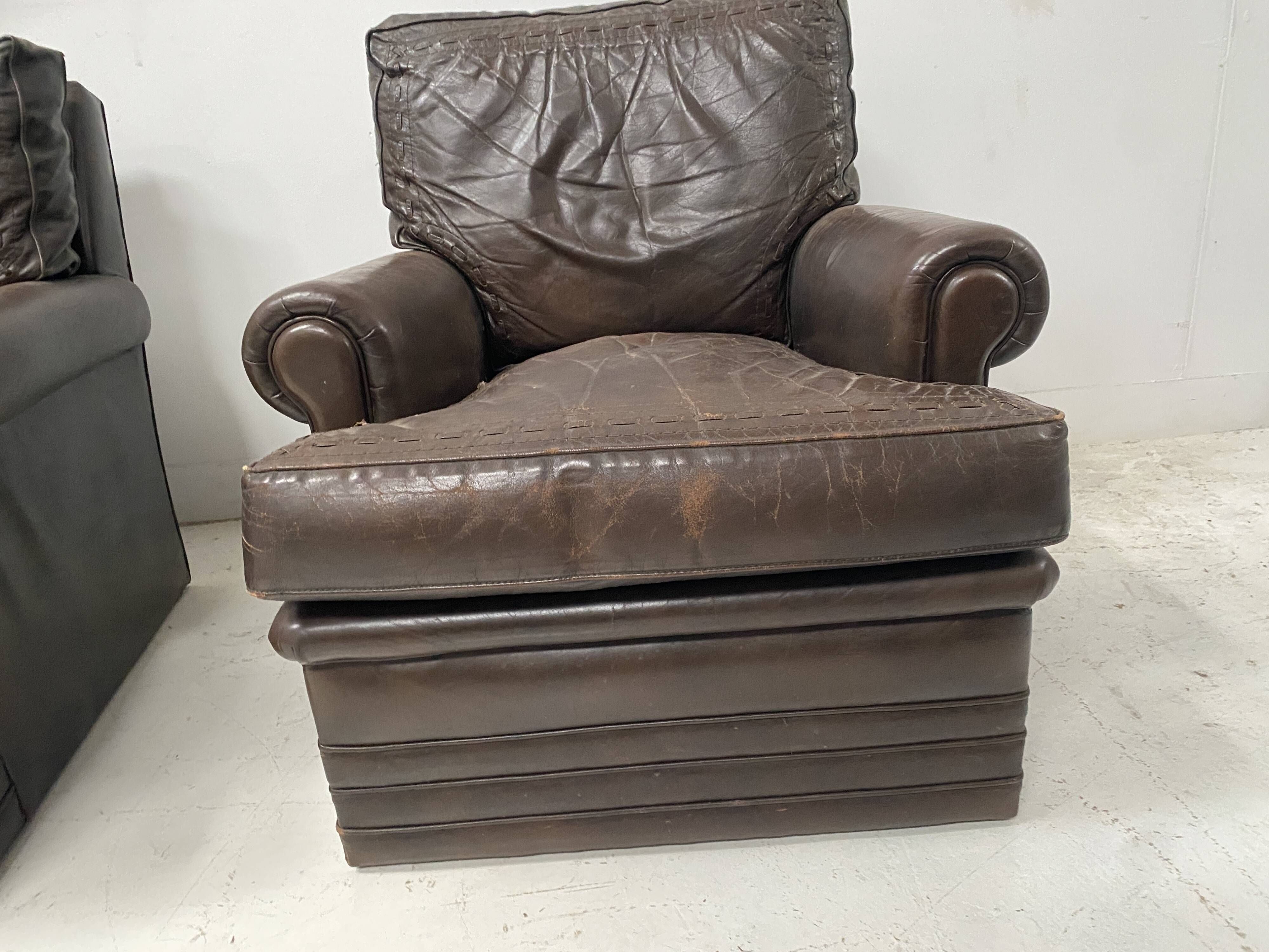 Pair of vintage brown leather armchairs from the 1970s.