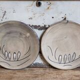 Duo of ceramic plates decorated with vintage foliage
