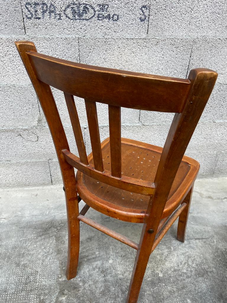 Two vintage curved wooden bistro chairs