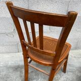 Two vintage curved wooden bistro chairs