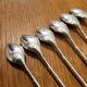6 long silver-plated metal spoons