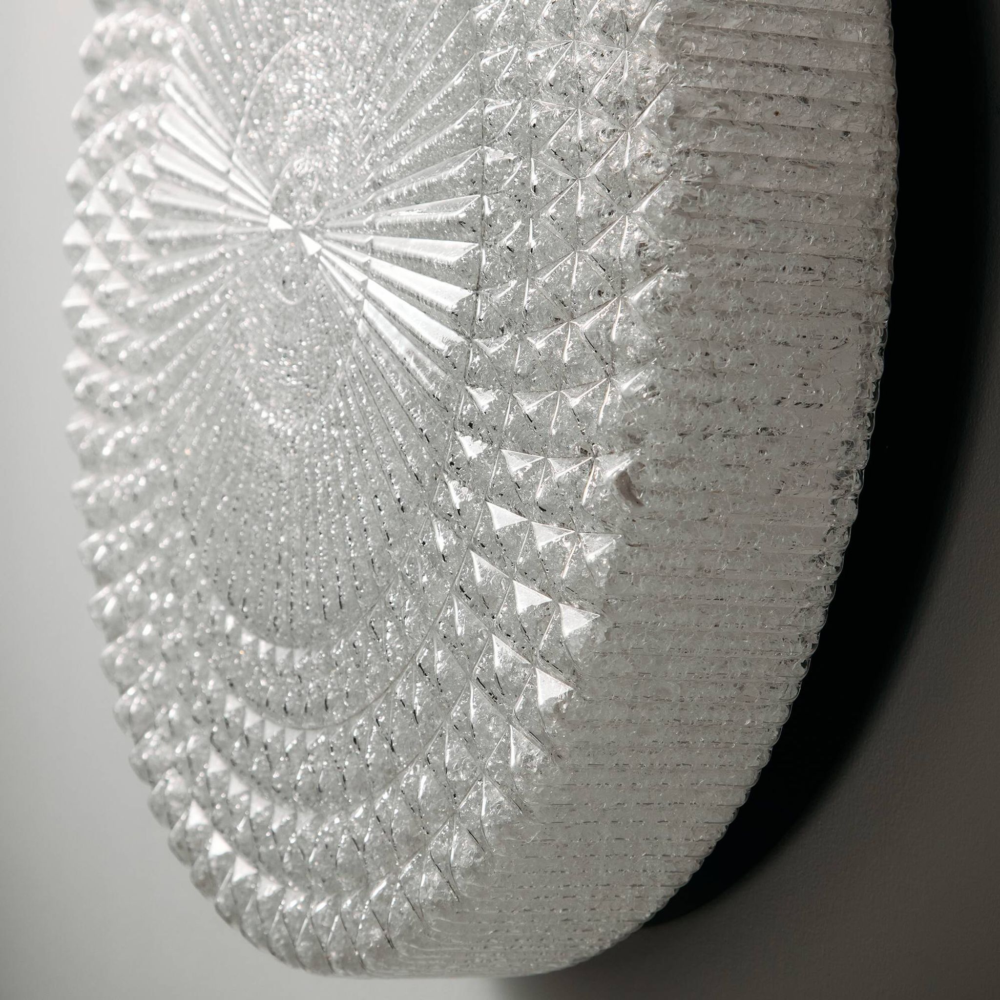 Wall light in metal and plastic