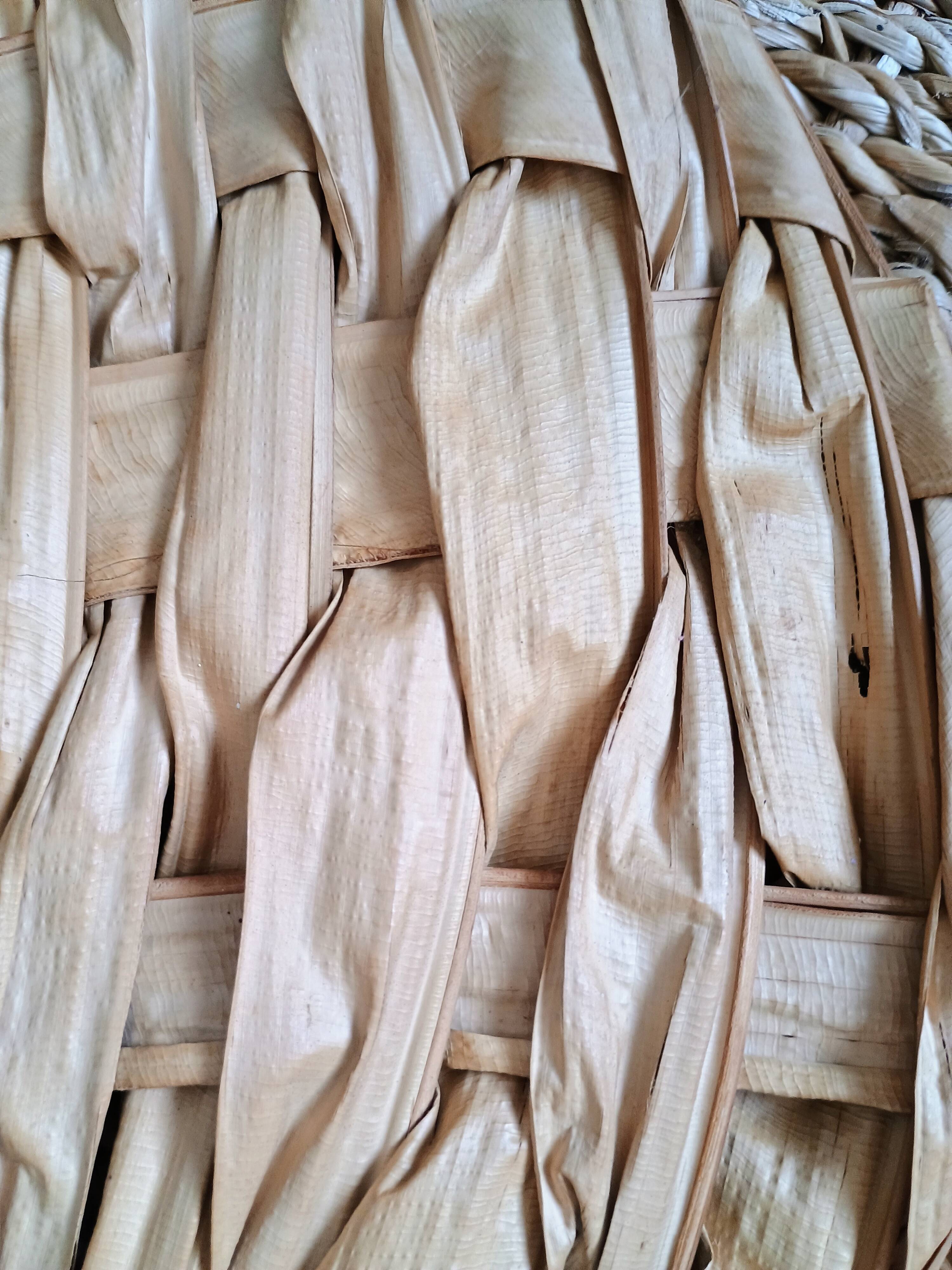 Heart fan in vintage woven palm leaves