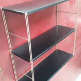 String shelf with twisted golden frame