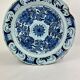 Delftware dish with blue flowers on a white background, 18th century, 35 cm