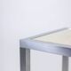 Maison Jansen. Console in brushed aluminium and verre églomisé top.