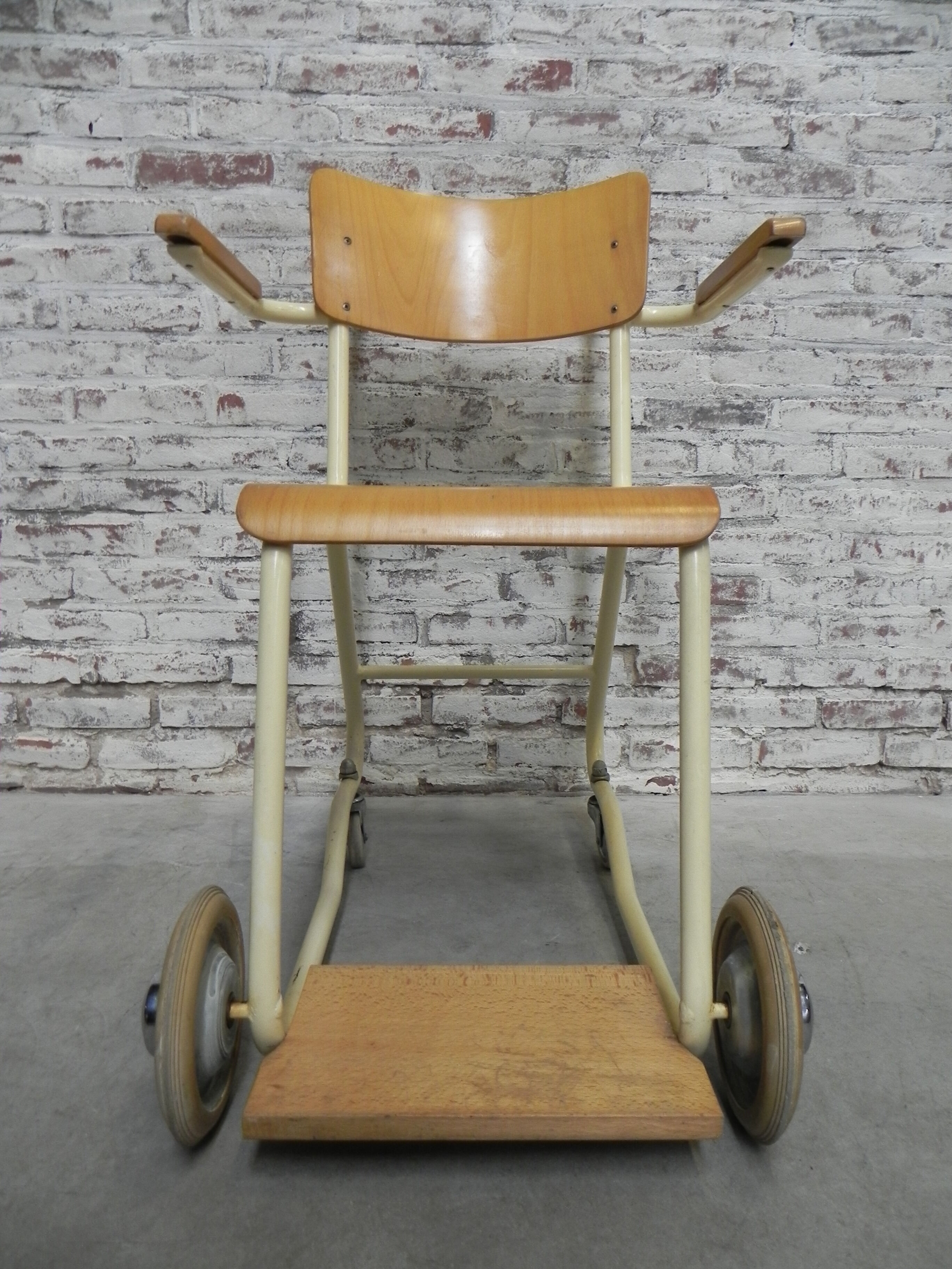 Vintage chair on wheels, wheelchair