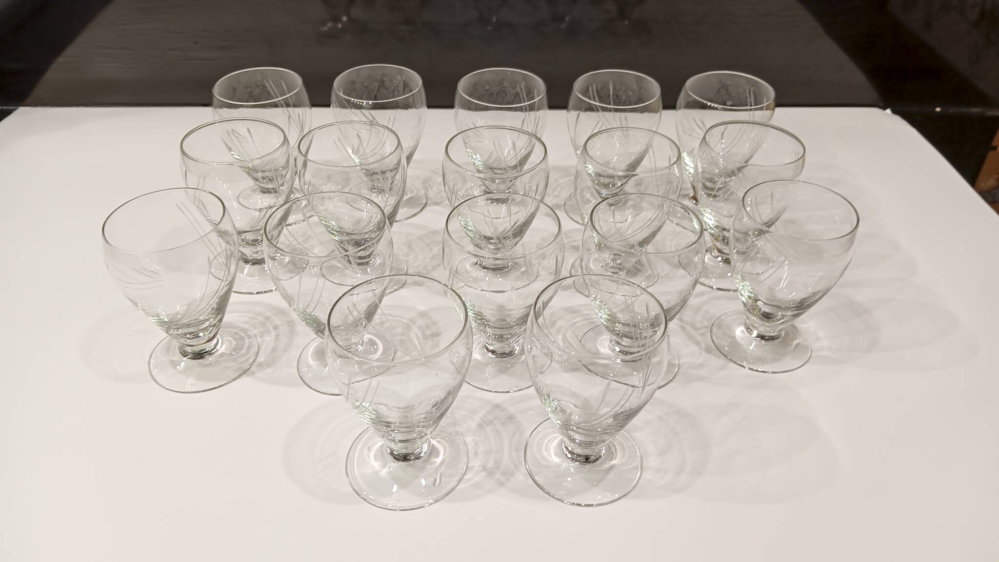 17 small crystal liquor glasses, chiseled pattern - Perfect condition.