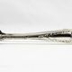 Christofle sugar tongs in silver-plated metal, Louis XV style, 19th century