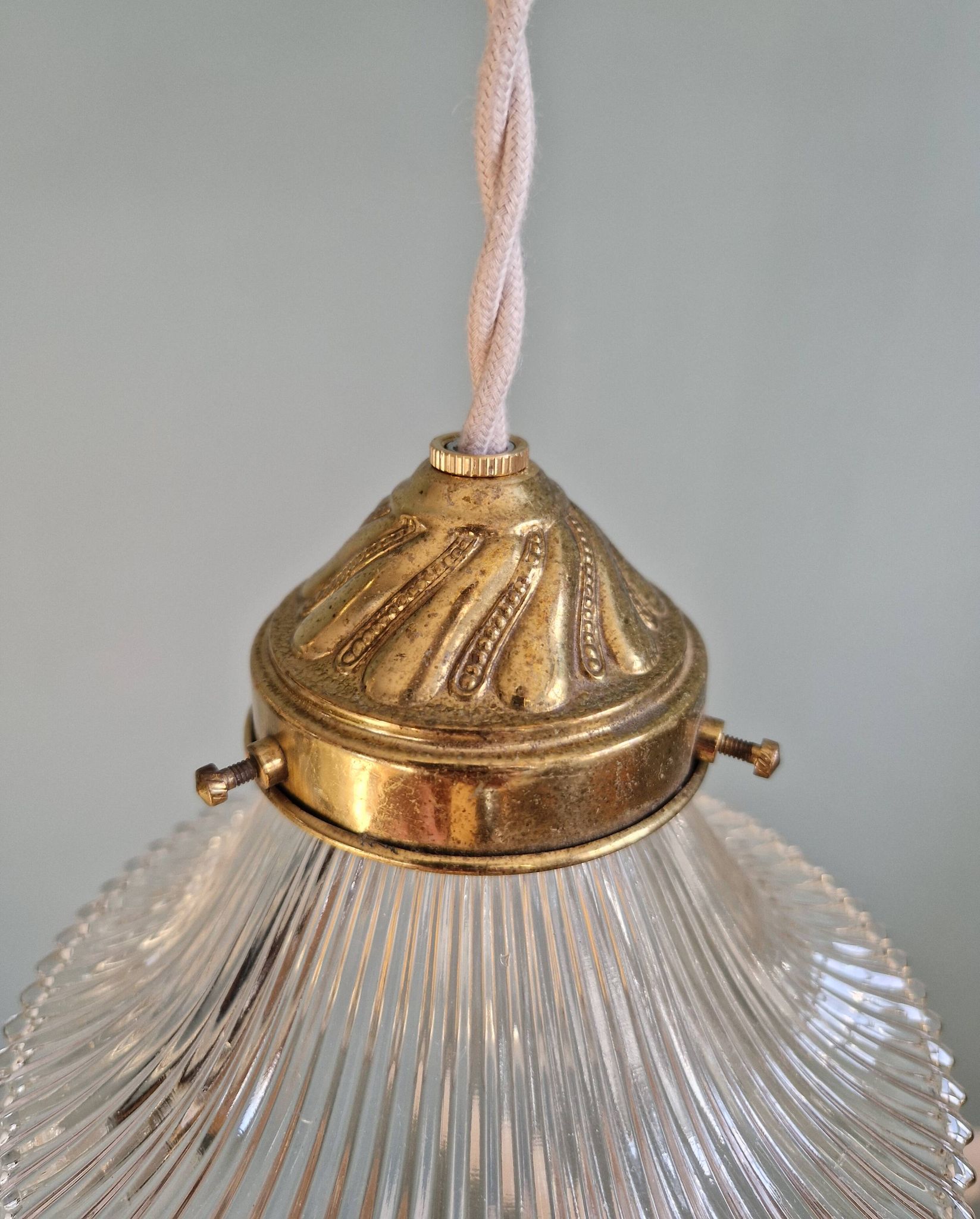 Trio of Art Deco grooved glass pendant lights, 1920s-30s