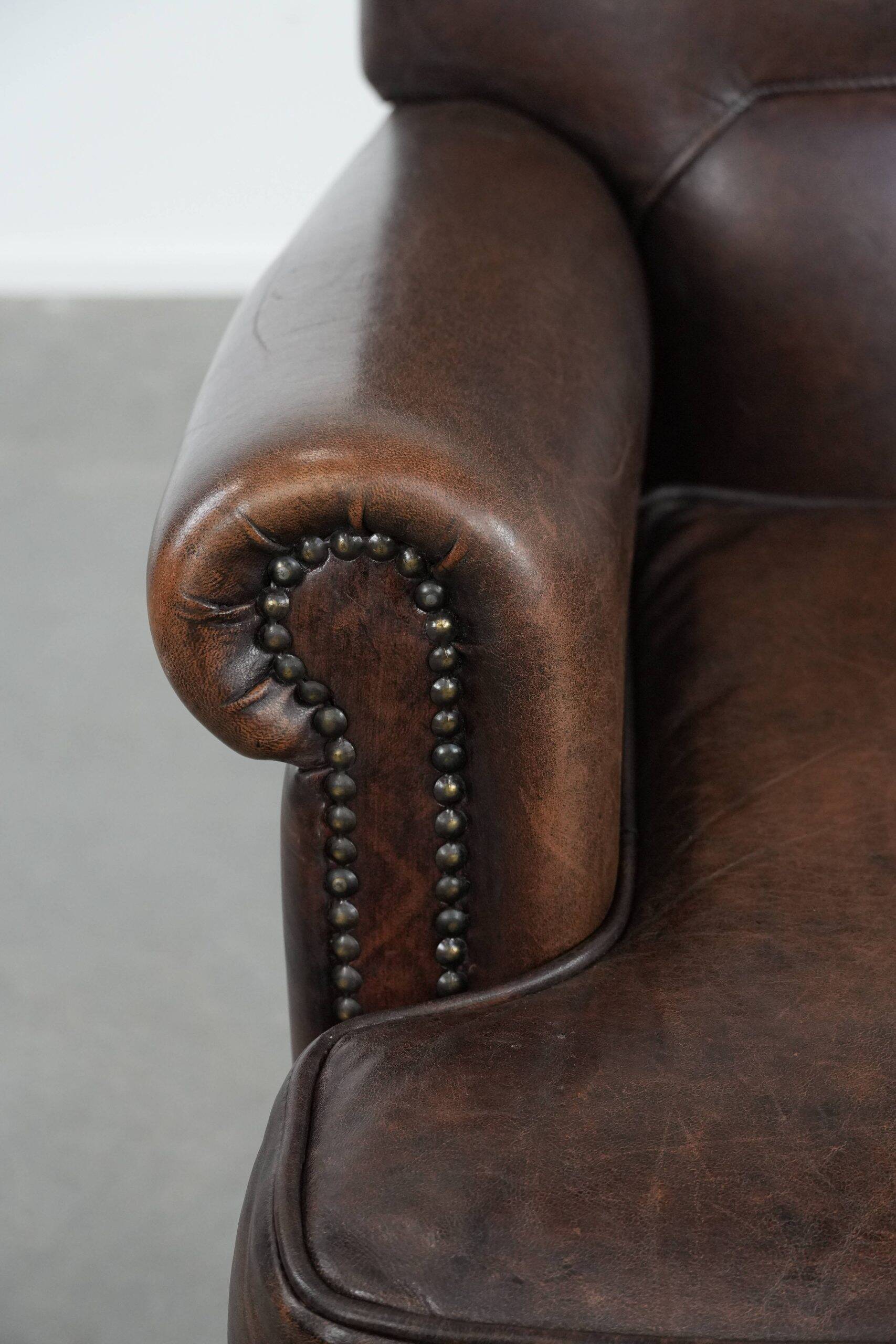 Beautiful Characterful Sheep Leather Armchair with a Deep Colour