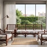 Salon vintage Maison Maugrion en rotin et finitions cuir et plume