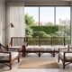 Vintage salon Maison Maugrion in rattan with leather and feather finishes.