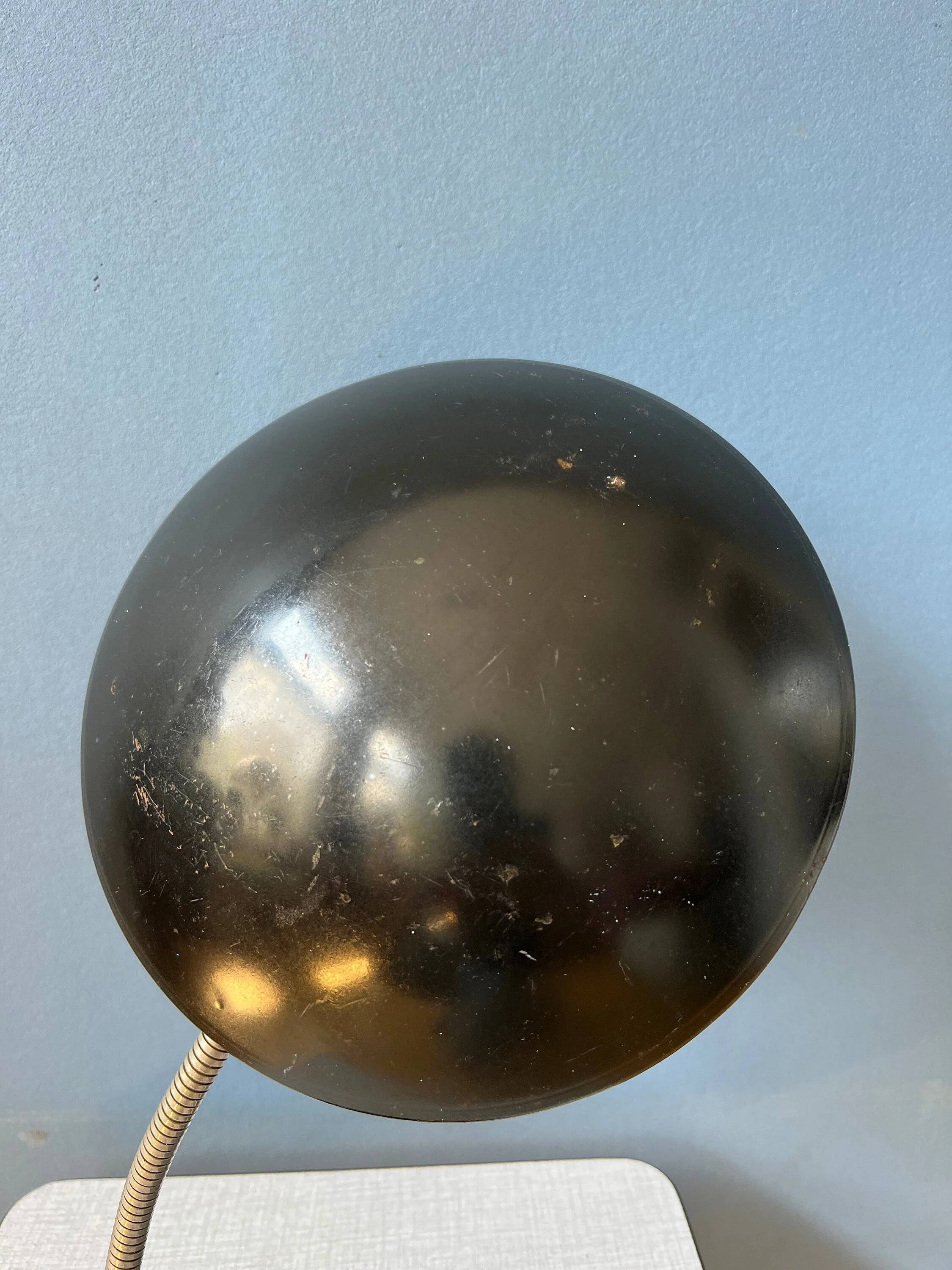 Small black metal desk lamp in Bauhaus style.