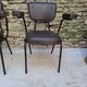 Brown faux leather armchairs