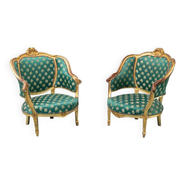 Pair of Louis XV style gilded armchairs with vintage green fabric