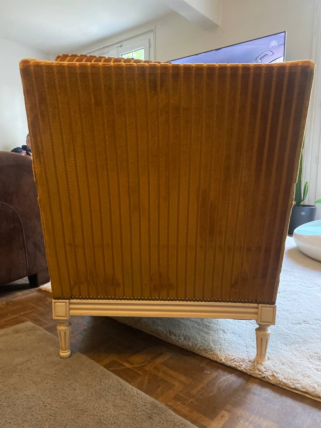 Mustard yellow velvet armchair