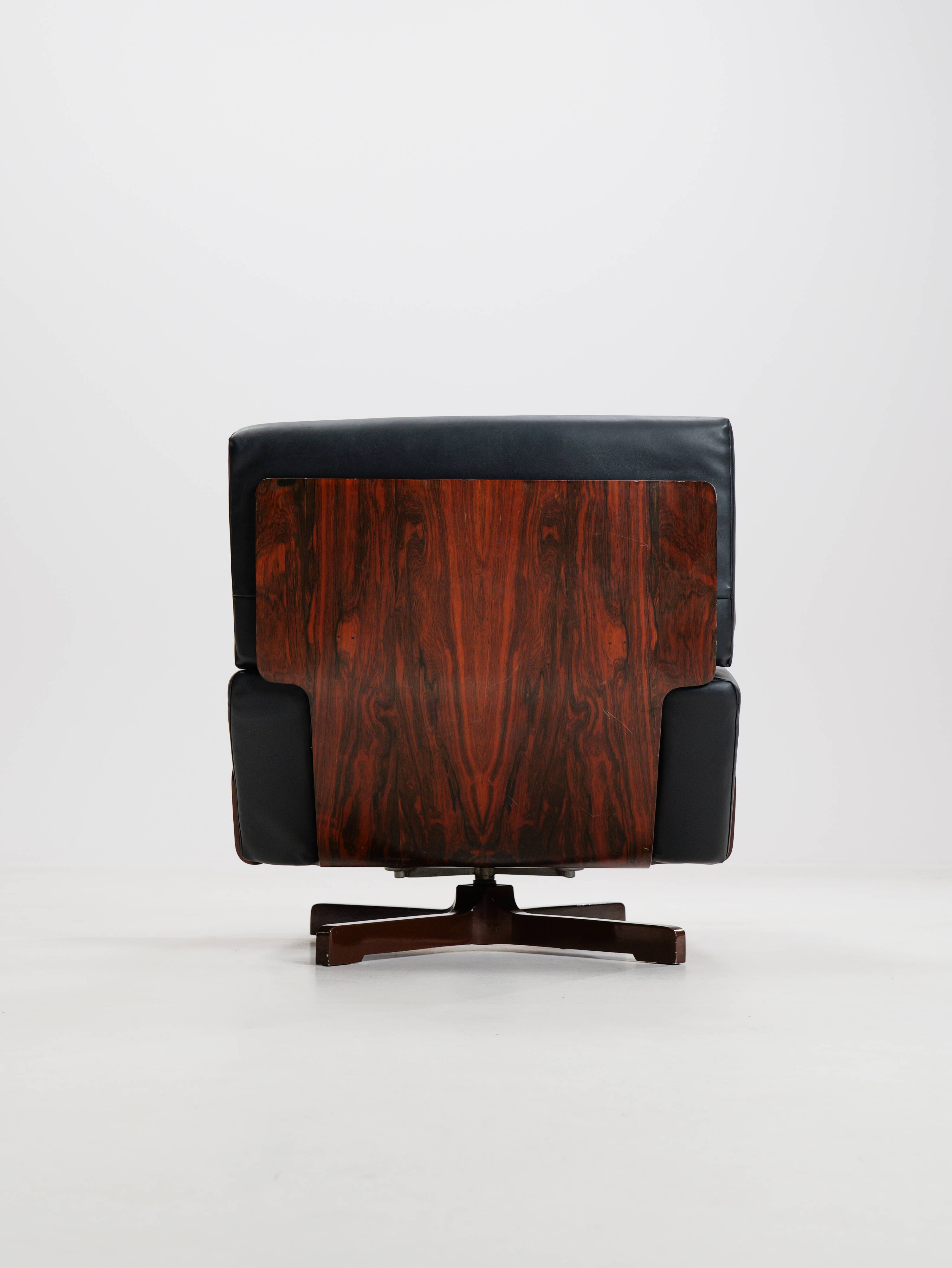 Swivel rosewood model 401 armchair by Menilio Taro for Cinova, 1960s