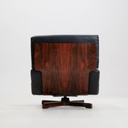 Swivel rosewood model 401 armchair by Menilio Taro for Cinova, 1960s