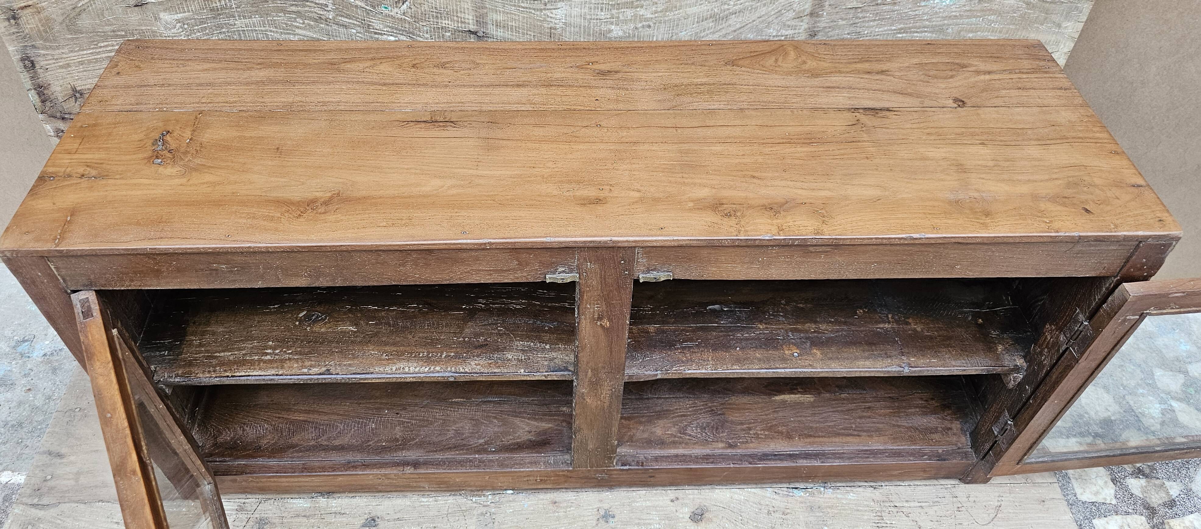 Buffet - glass TV cabinet in Burmese teak