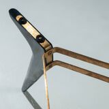 Triangular coffee table in the manner of Alfred Hendrickx