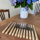 Series of 12 vintage table knives