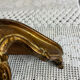 Small baroque-style console in gilded wood.