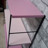Pink string shelf with black uprights. 47x49x16