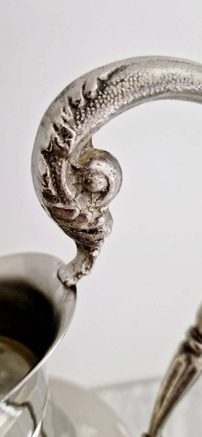 Glass and silver-plated carafe