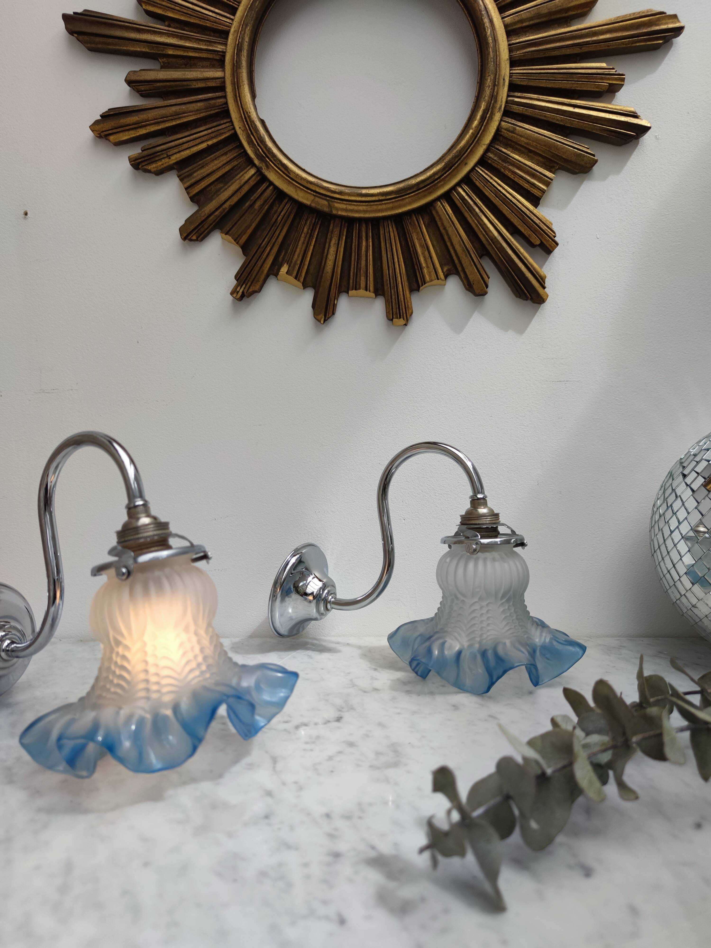 2 blue swan collar sconces