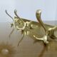 Large wall-mounted coat rack in gold aluminum, 60s-70s