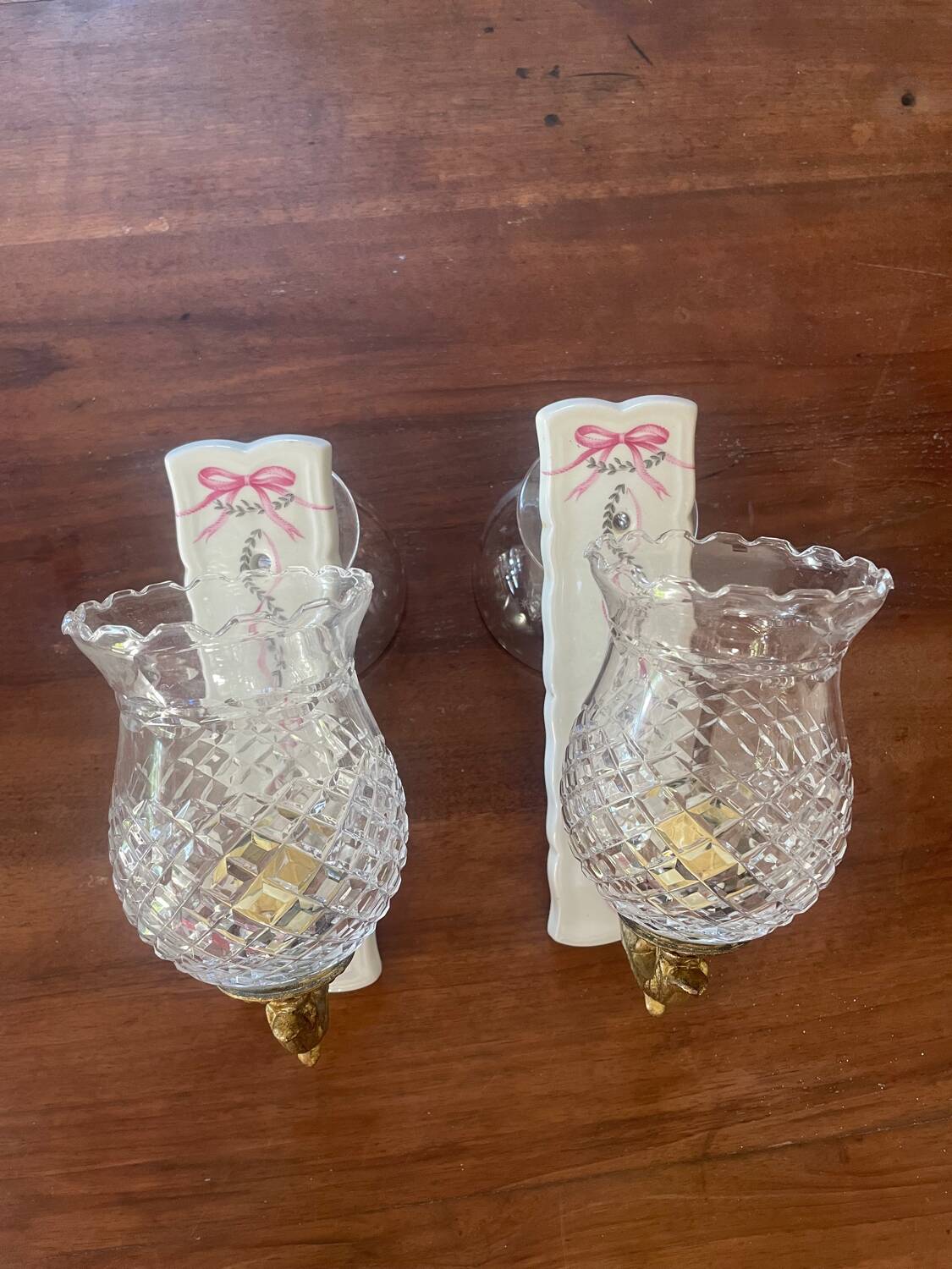 Pair of cut glass and Limoges porcelain wall sconces