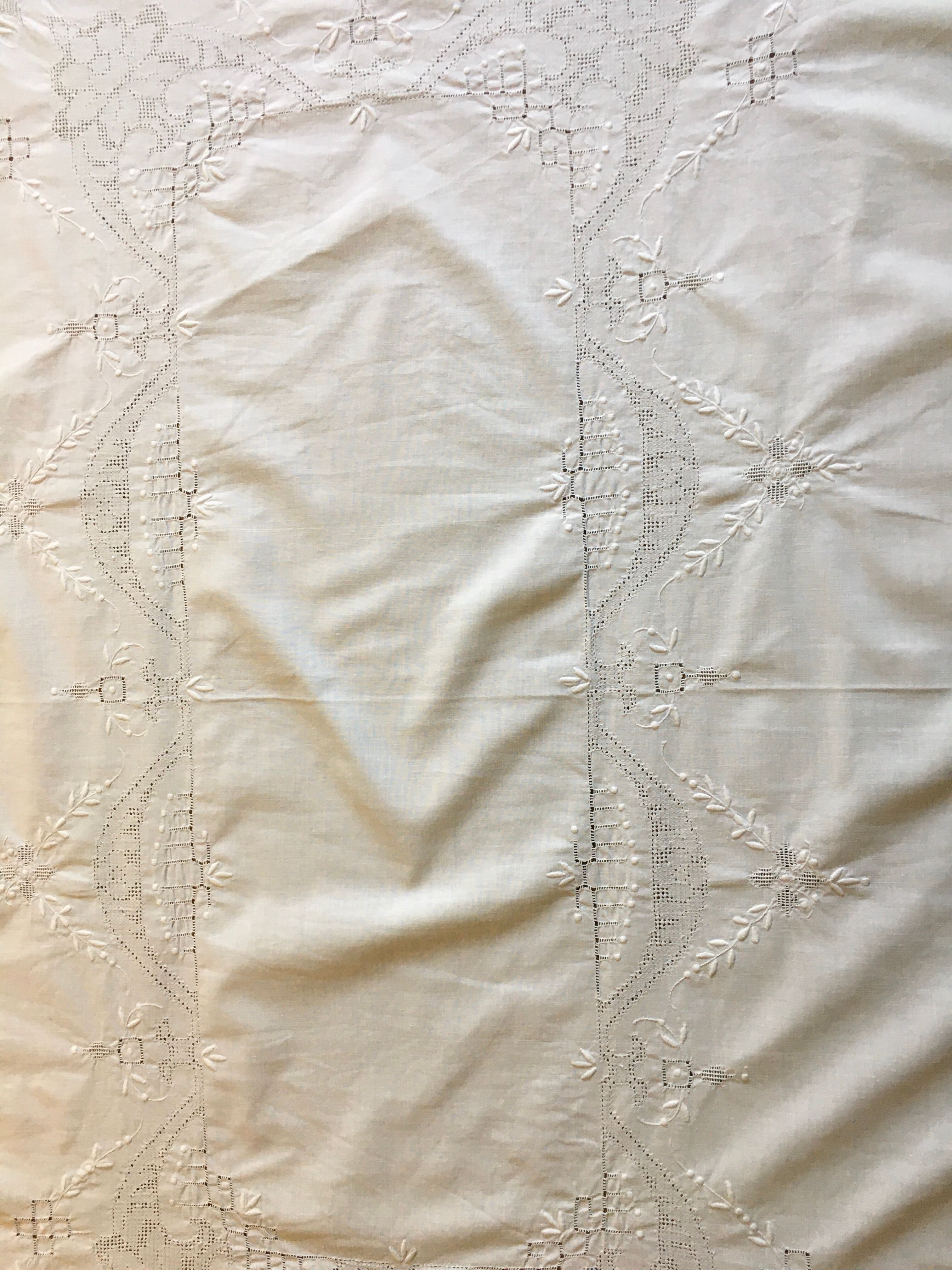 Old white tablecloth embroidered hand