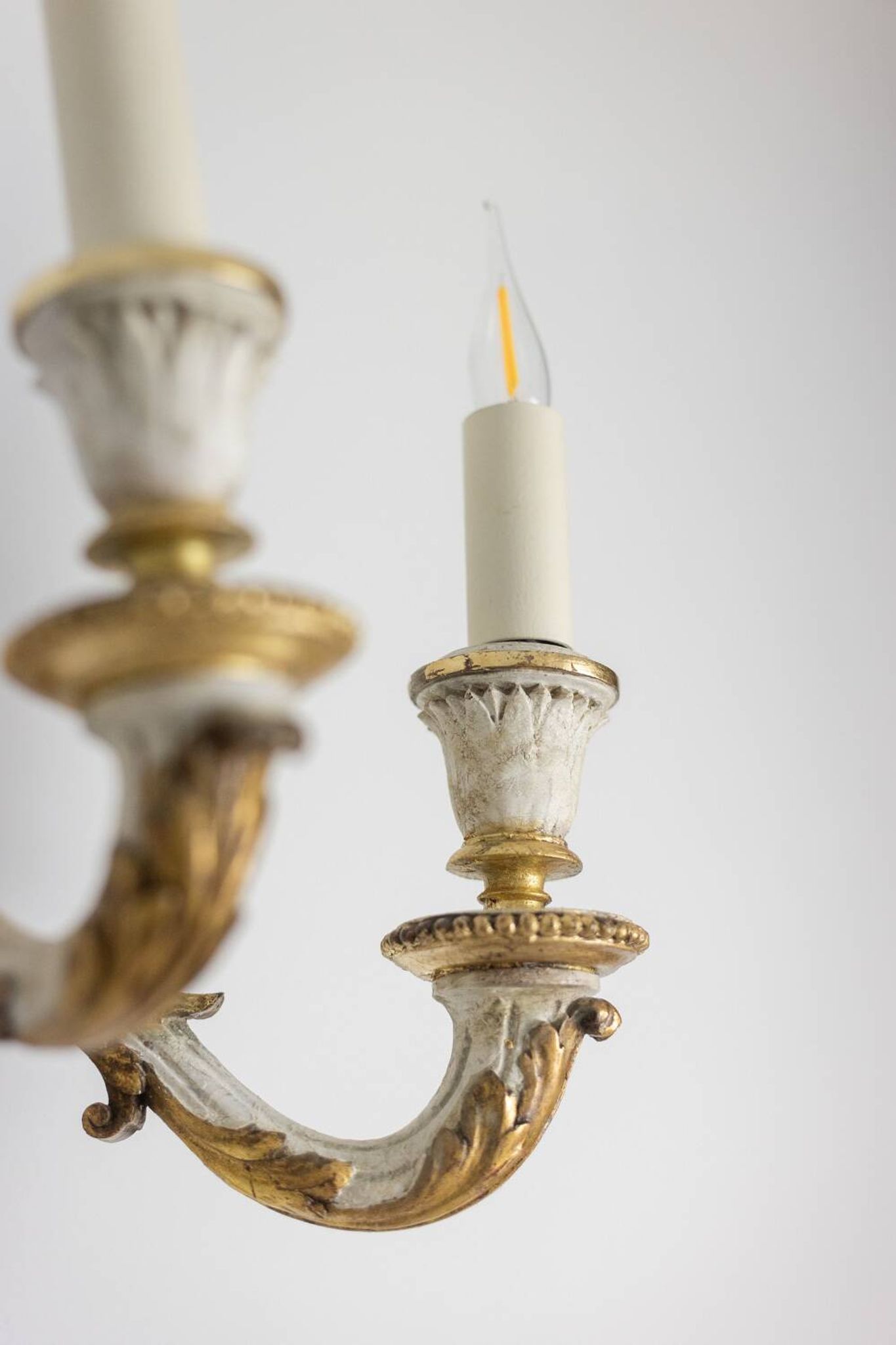 Pair of Louis XVI style wall lights in gilded and lacquered wood. Circa 1900.