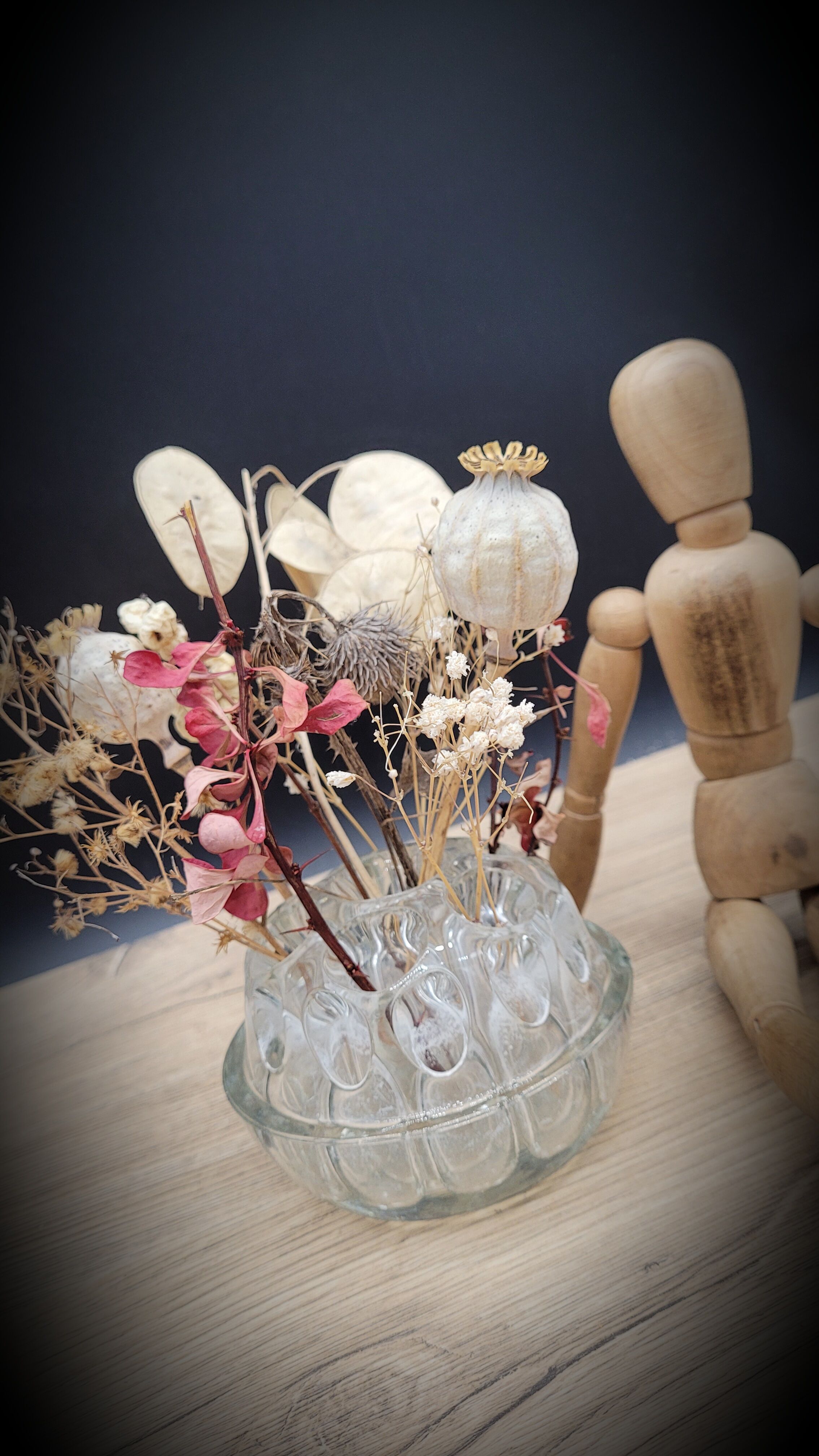 Pique flowers in glass of Reims