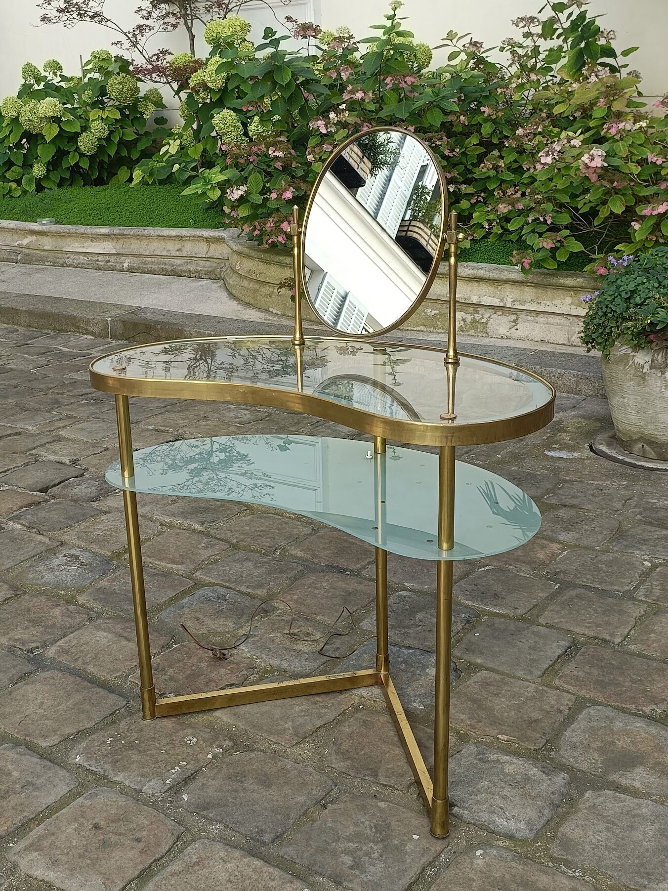 Brass and glass dressing table, with mirror, lighting and steering wheel, by Luigi Brusotti - 1940