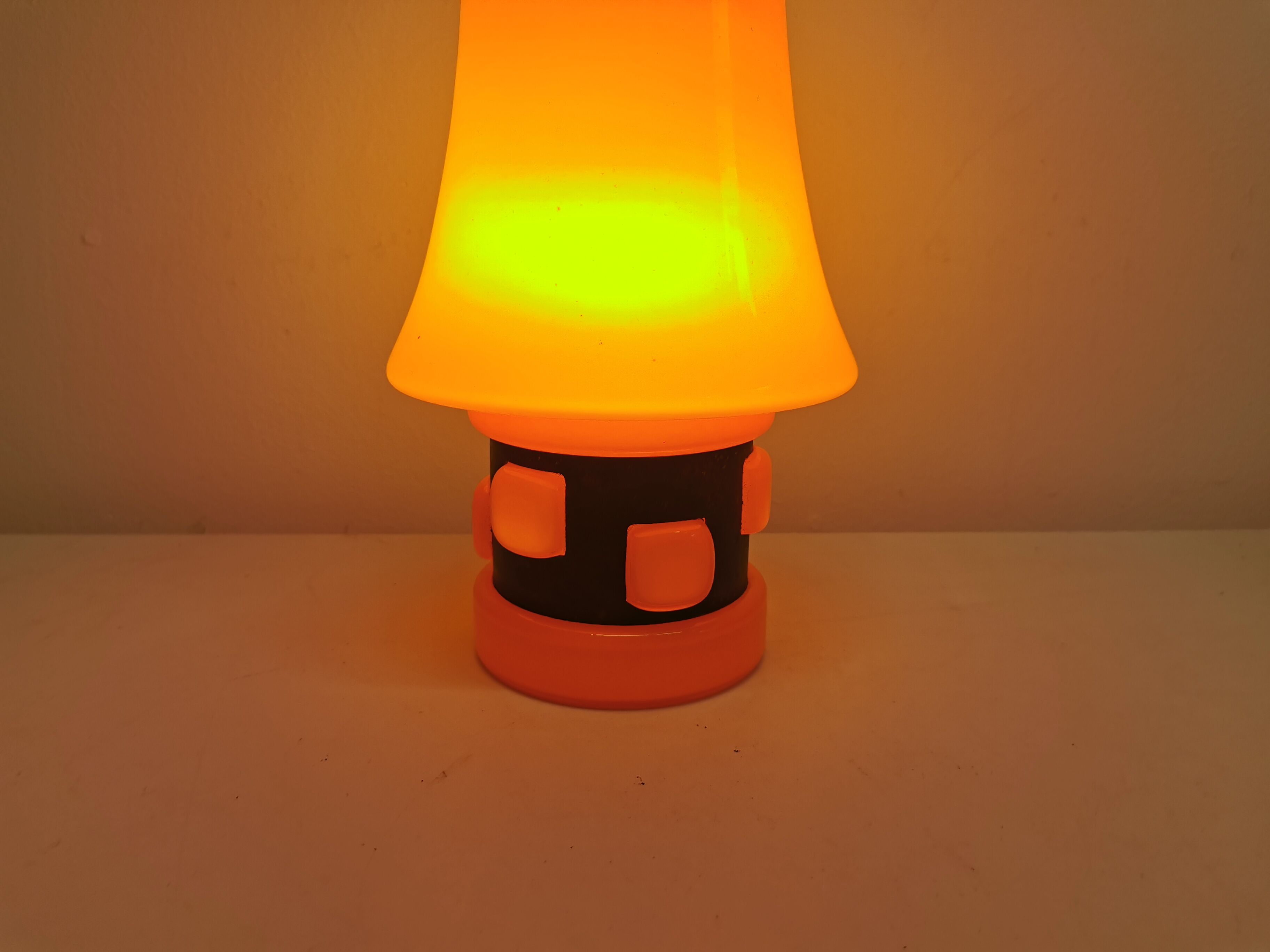 Table lamp, made in red double layer glass with metal details. estimated from the 1960s