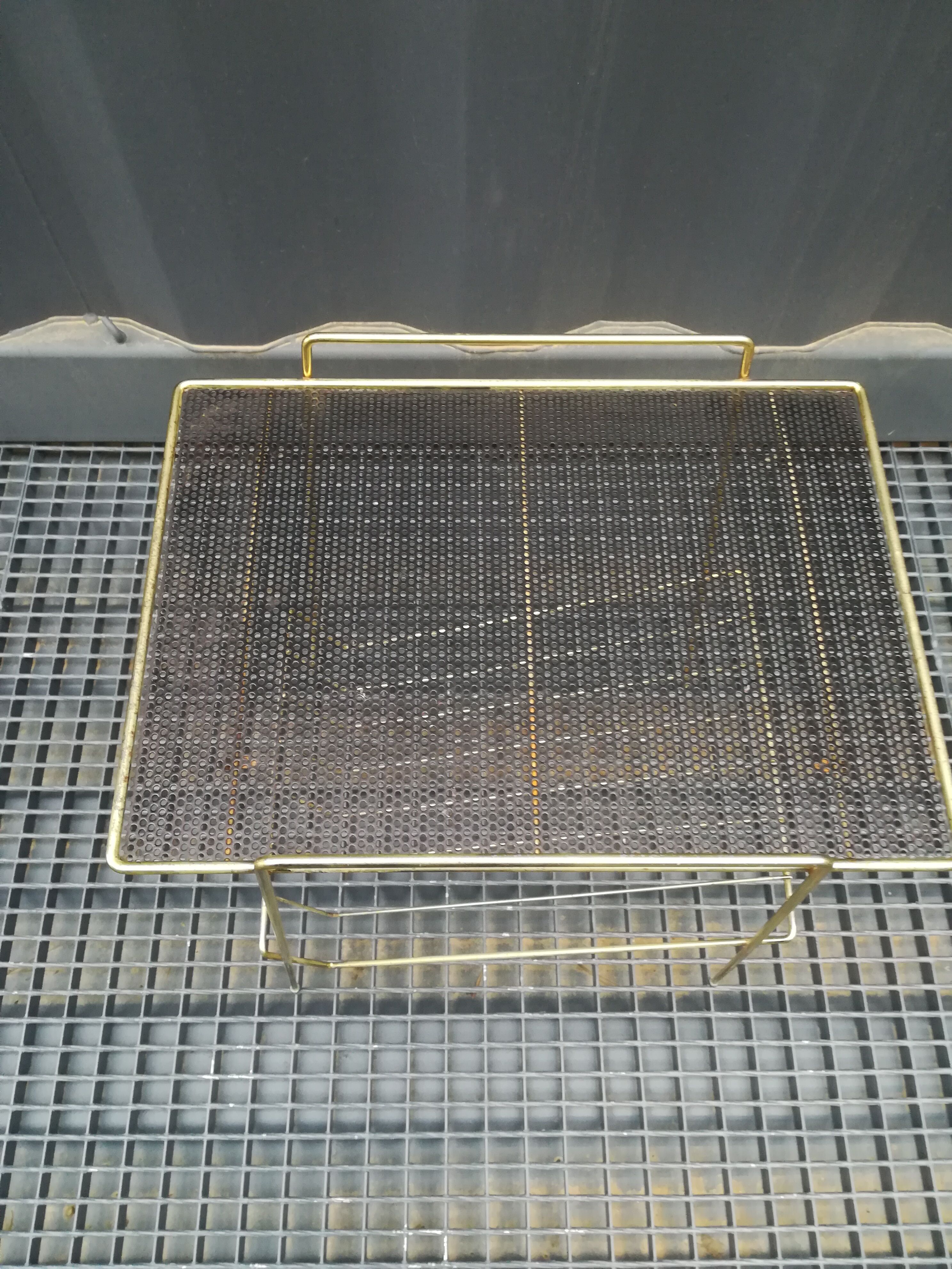 Gold sofa tip in perforated metal