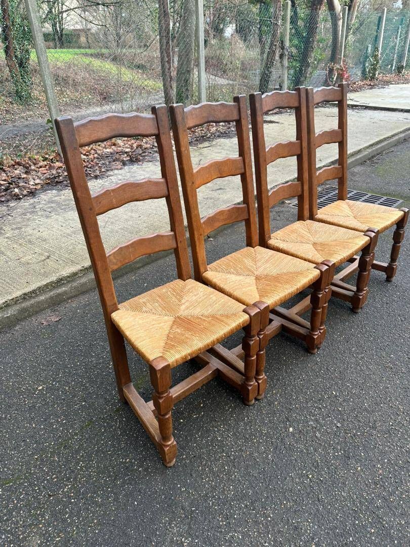 4 dining chairs made of solid wood with straw seats, farmhouse style, medium oak, 20th century, 110cm.
