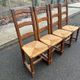 4 dining chairs made of solid wood with straw seats, farmhouse style, medium oak, 20th century, 110cm.