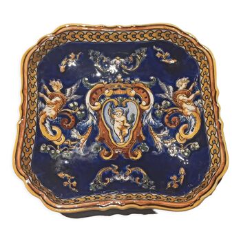 Earthenware dish from Gien, renaissance model cobalt blue background