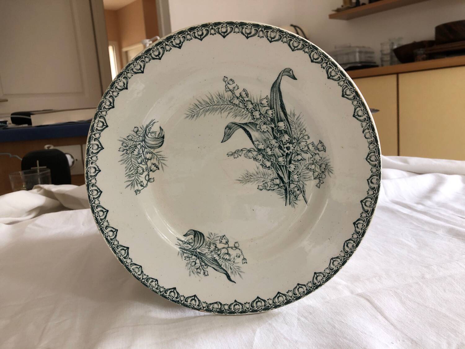 17 St Amand ironware plates, "Muguet" model