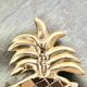 Vintage brass pineapple pocket emptier