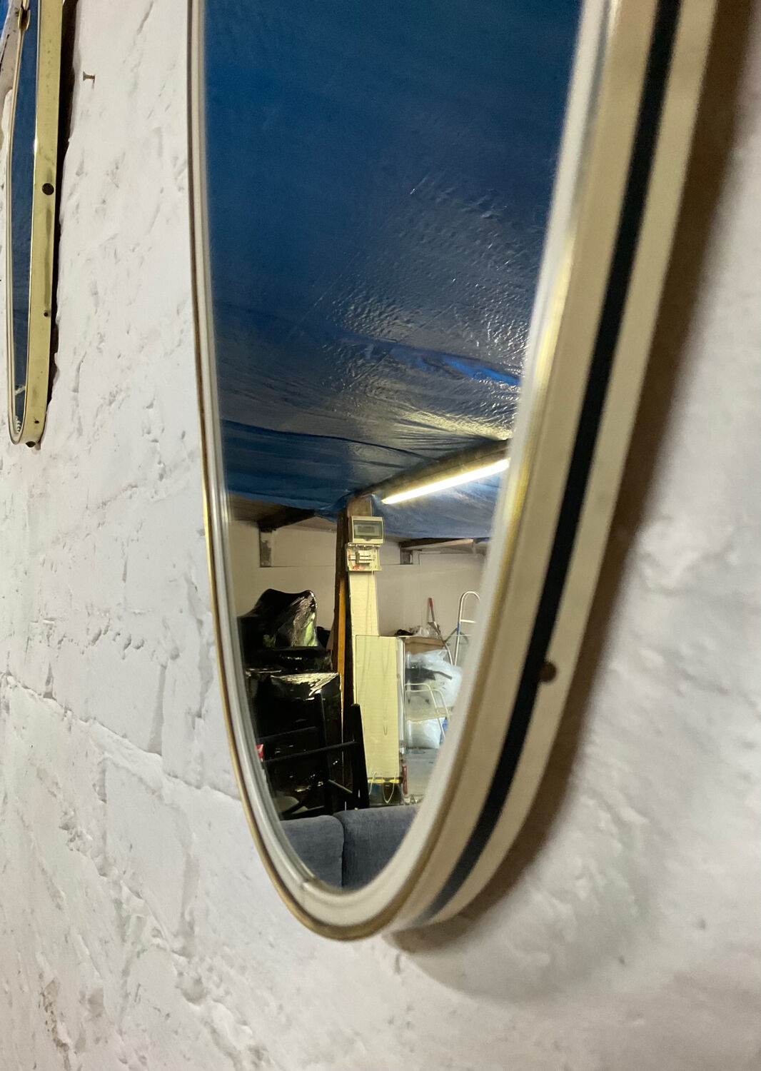 Asymmetrical free-form mirror from the 60s-70s