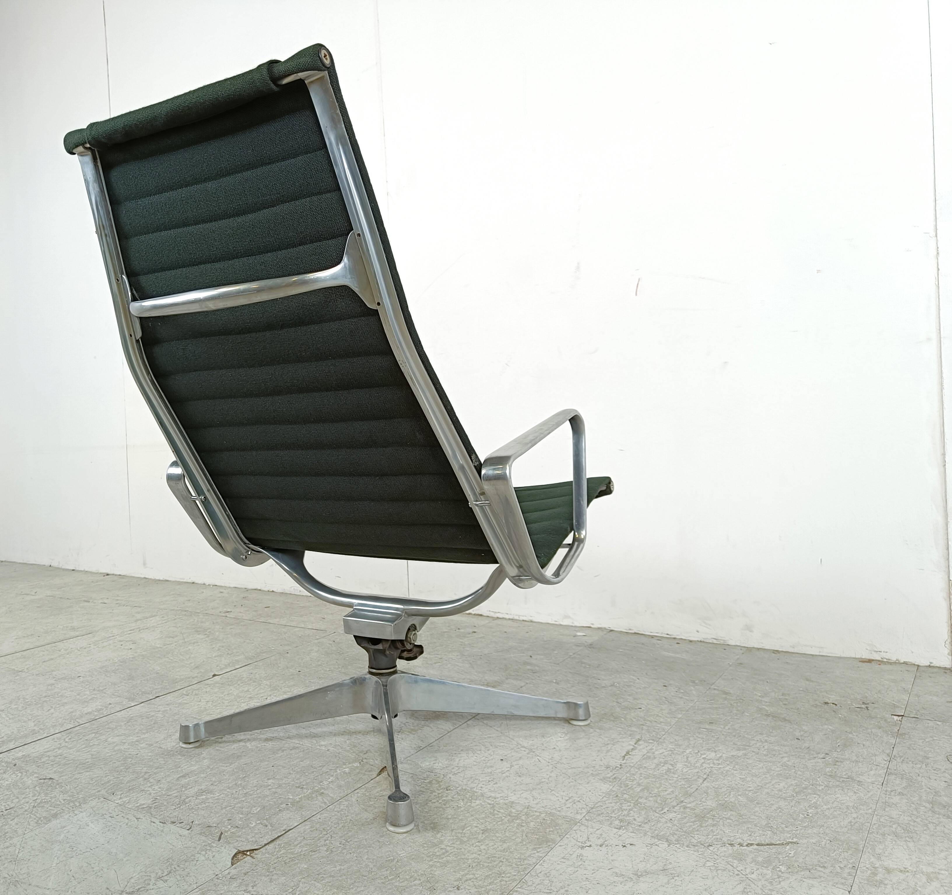 Charles & Ray Eames EA124 Lounge chair in black fabric, 1970s