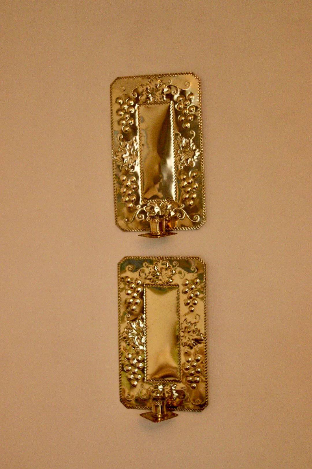 A pair of Swedish brass wall sconces from the mid-century.