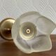 Pair of tulip-shaped candle holders in frosted glass and brass.