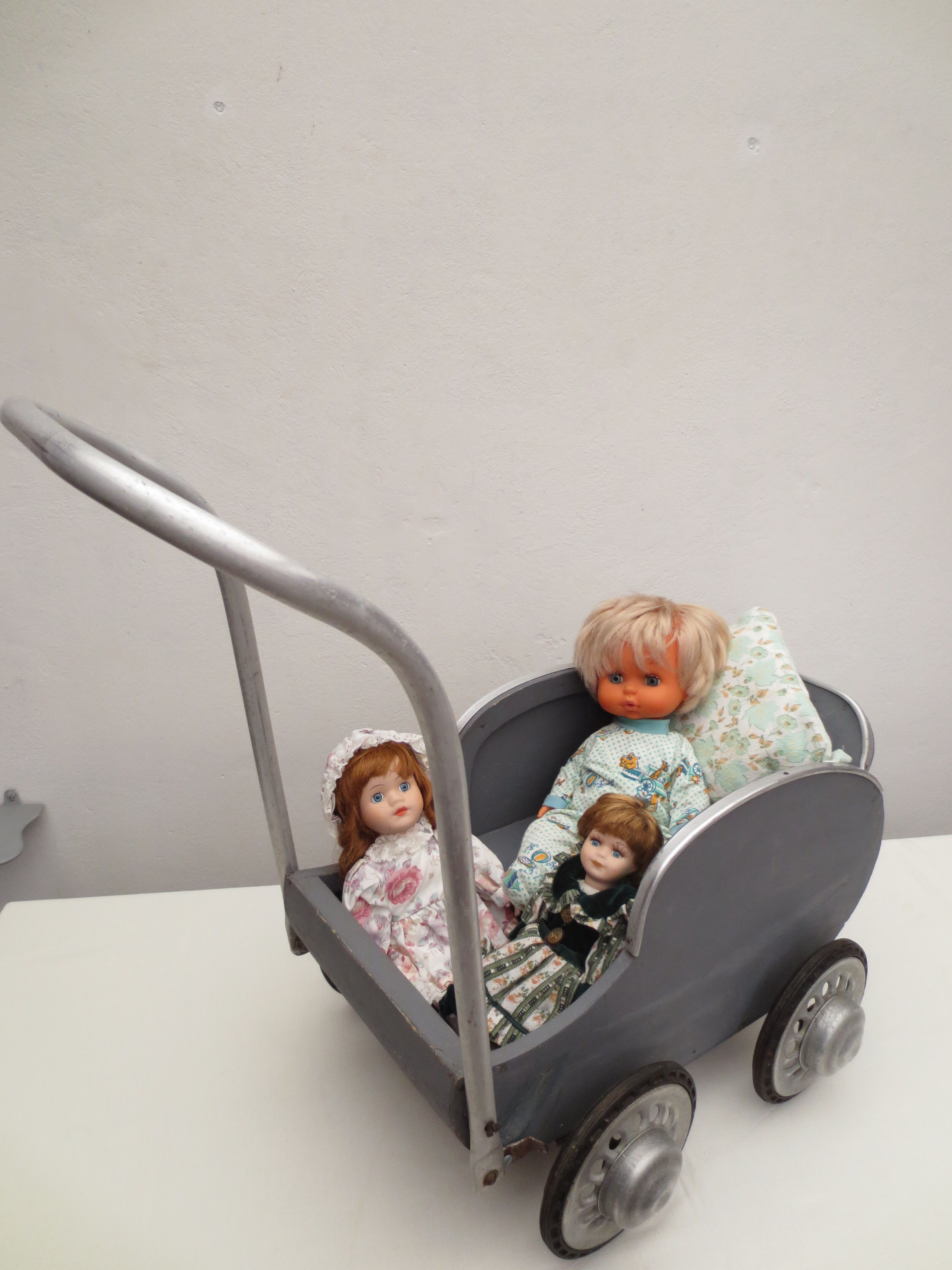 40 year old doll stroller, wood and aluminum