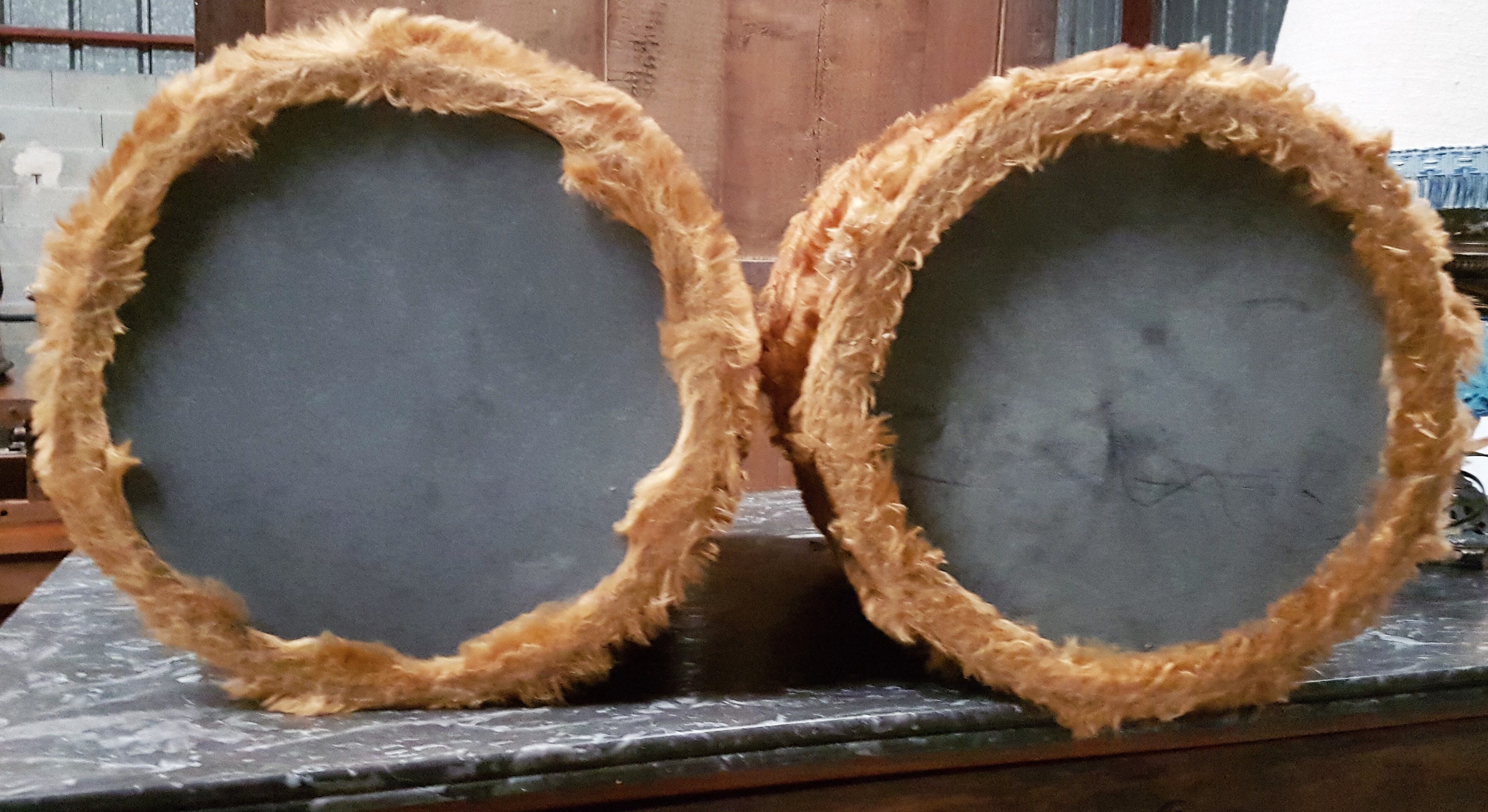 Pair of old vintage pouffes in fluffy hair